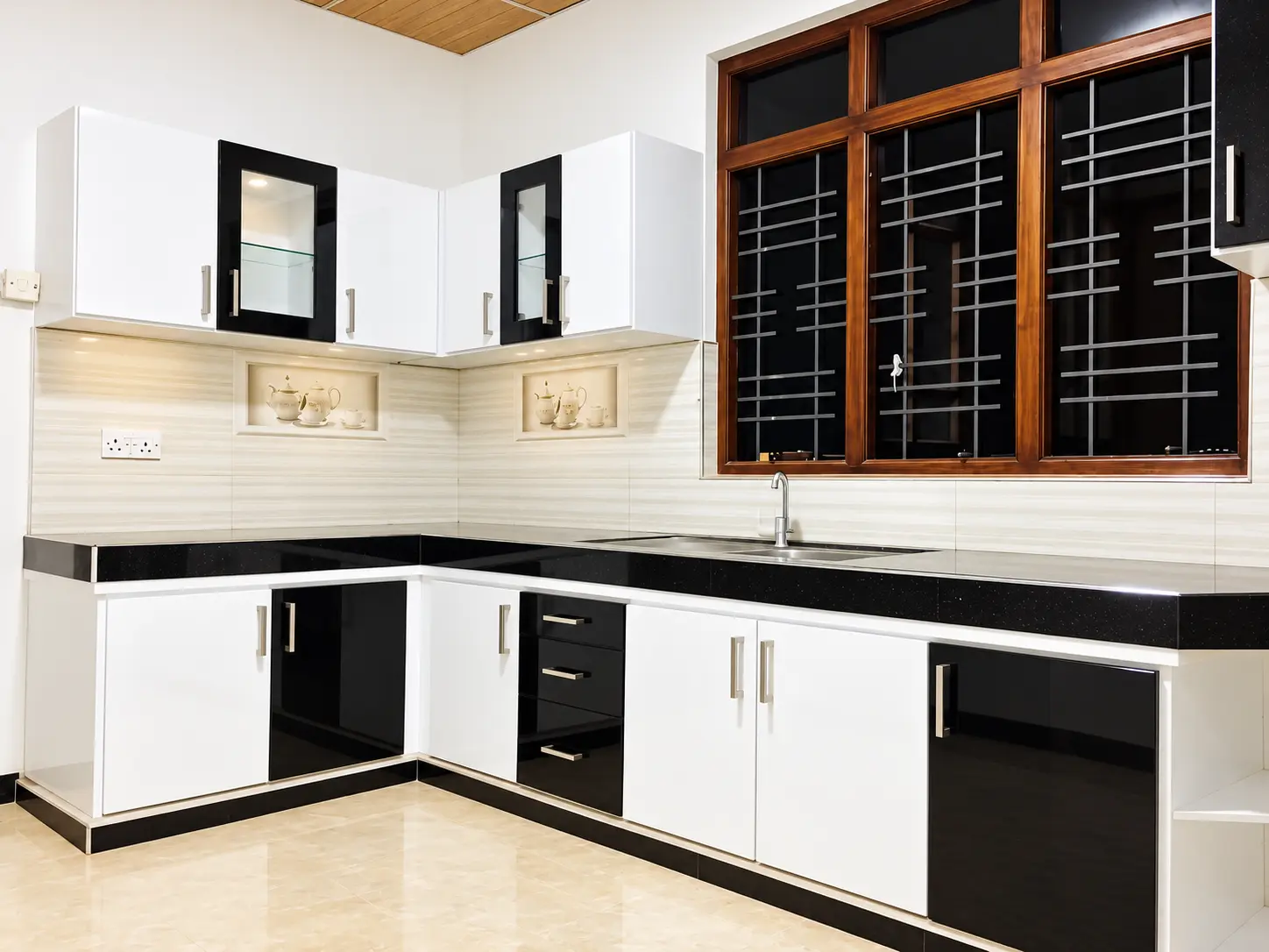 White-and-black pantry beside a timber-grilled window
